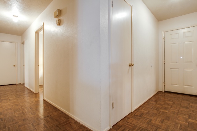 Take note of the original wood floors!