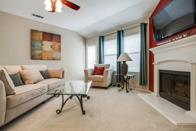 Cozy up near the wood burning fireplace in the family room.