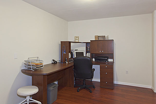 Large office with new hardwood floors and walk in vault