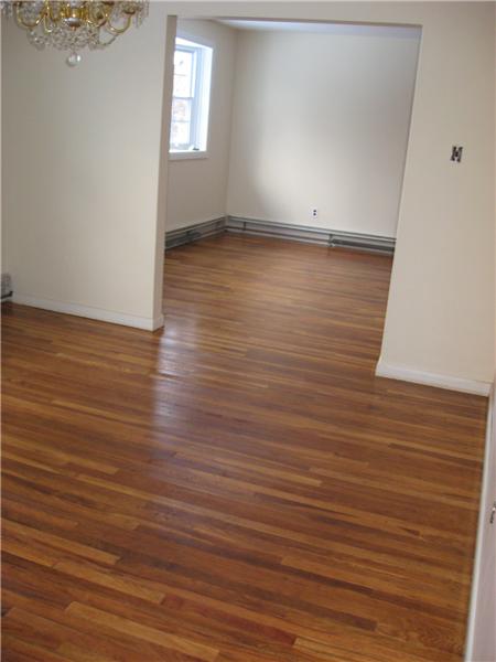 Dining room with hardwood floors.