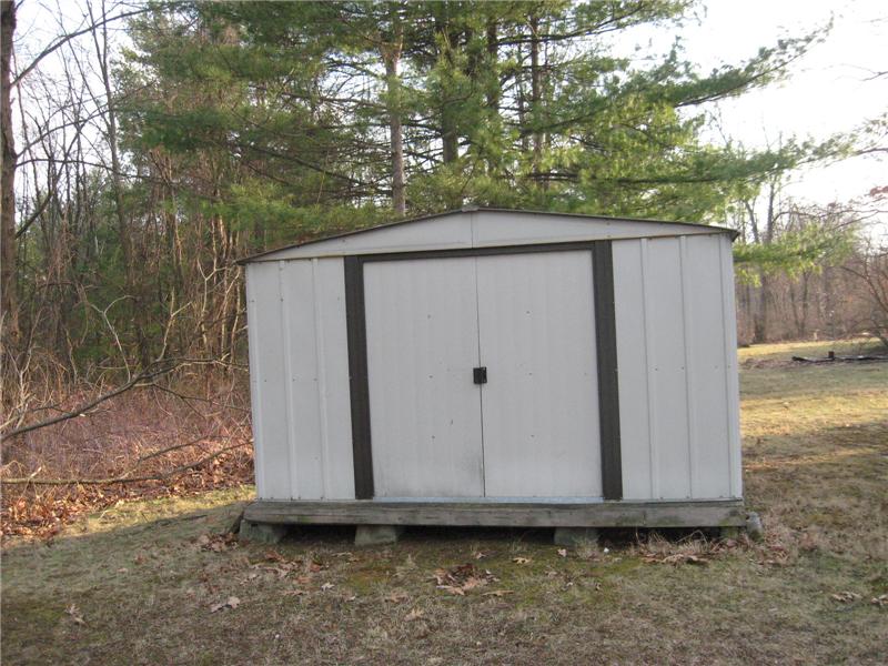 Storage shed for additional storage.
