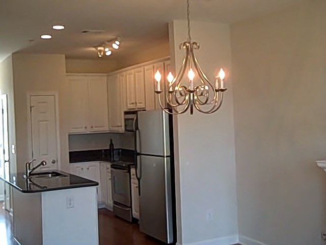 Stainless Steel Appliances in Kitchen with seperate Dining Room
