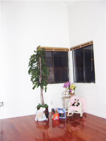 Gleaming Hardwood Floors in Children's Room/Den ss Steel Kitchen at 20644 Oak Creek, Saratoga