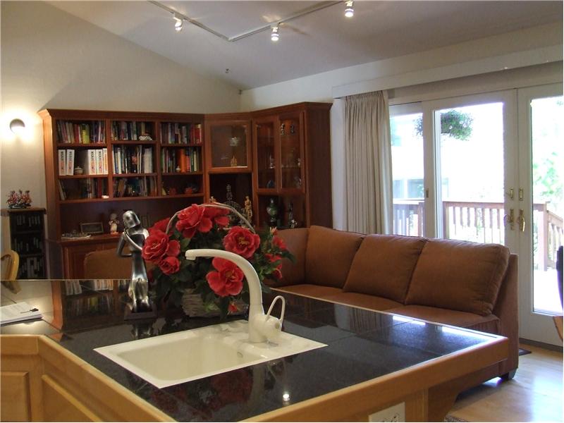 Beautiful Lighted Built-In BookCase in Family Room!