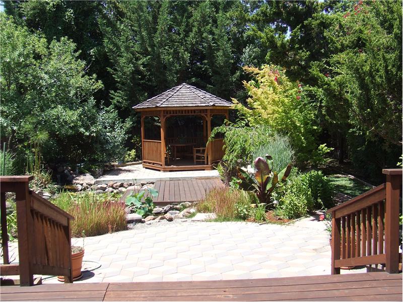 Terraced Decks & Pavers + Paths & Tropical Plants