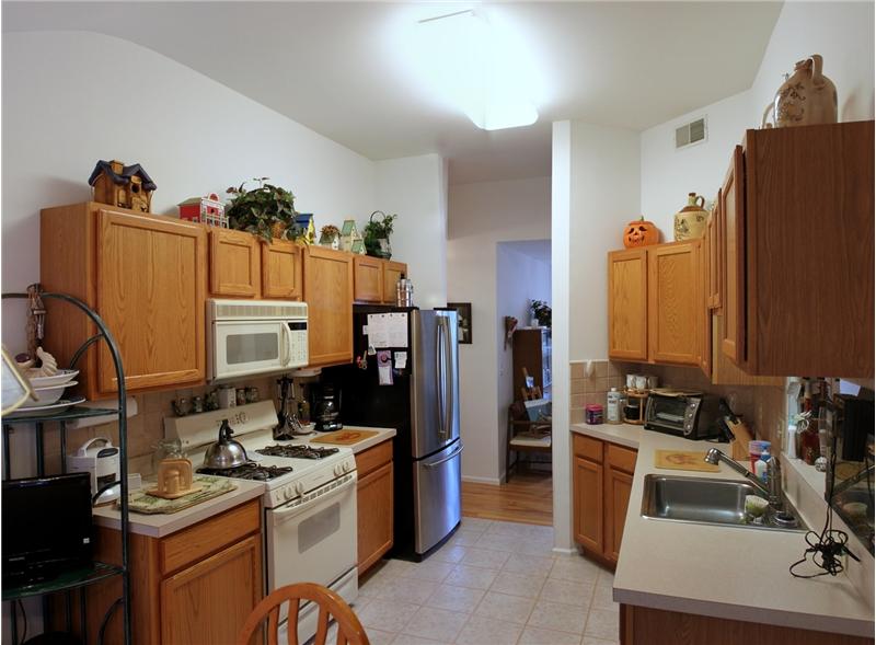 eat in kitchen with lots of cabinets