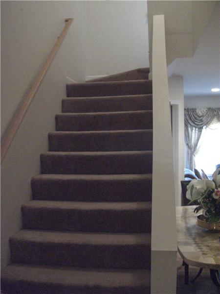Stairs to upper level bedrooms