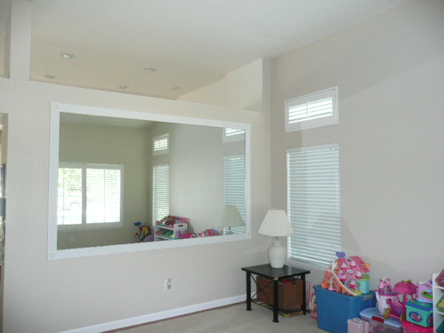 Great mirror stays with property