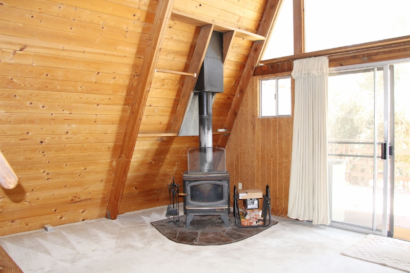 Inside A Frame Suite, 1 bedroom 1 bath with wood burning stove and loft