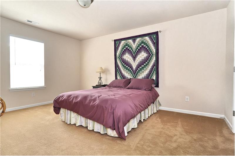 Second very spacious bedroom with wall-to-wall carpeting & lots of closet space