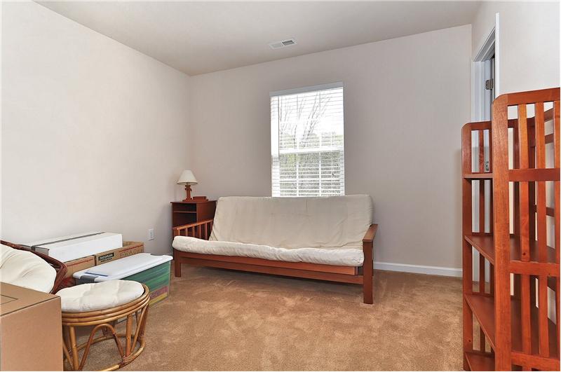 Third spacious bedroom has wall-to-wall carpeting & lots of closet space