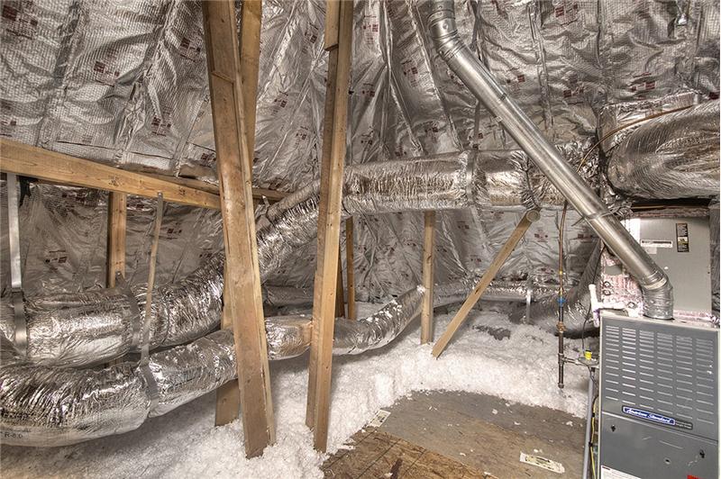 Energy efficient aluminum insulation in attic