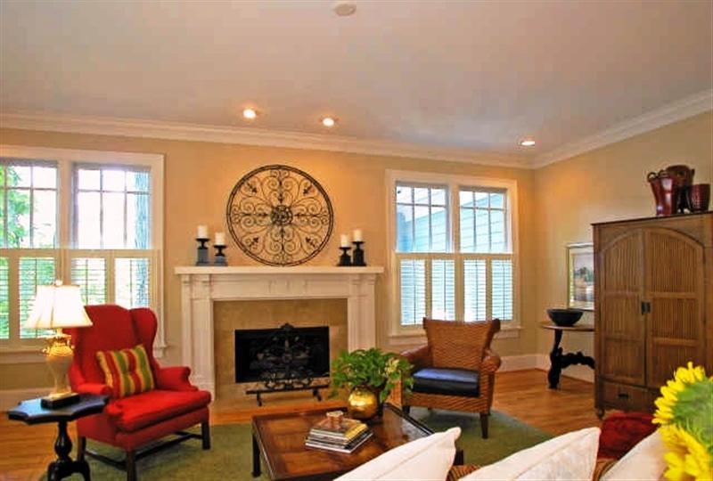 Greatroom features gorgeous hardwoods, recessed lighting, plantation shutters and a gas fireplace