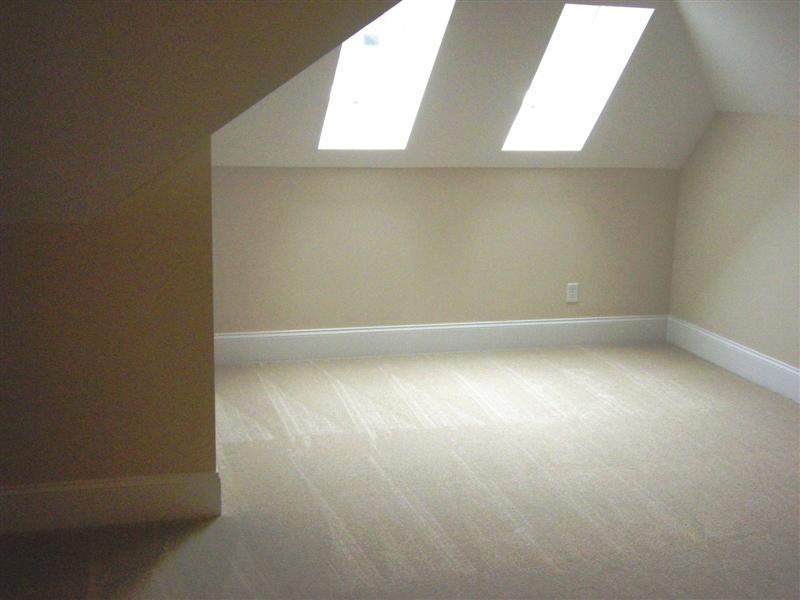 Oversized bonus room has wall-to-wall carpet and lots of walk-out storage space