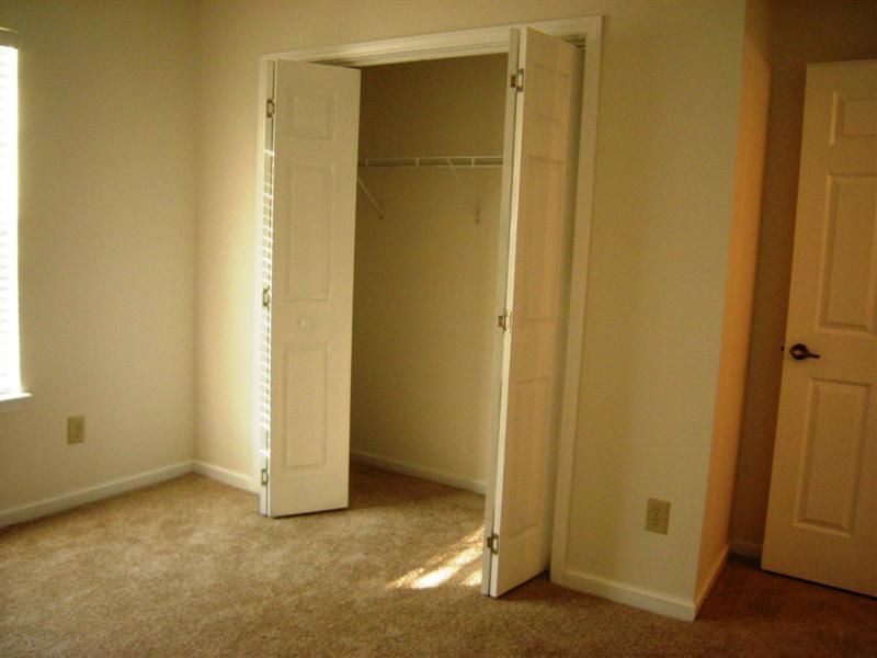 Third bedroom also has double door closet, wall-to-wall carpet and fresh paint