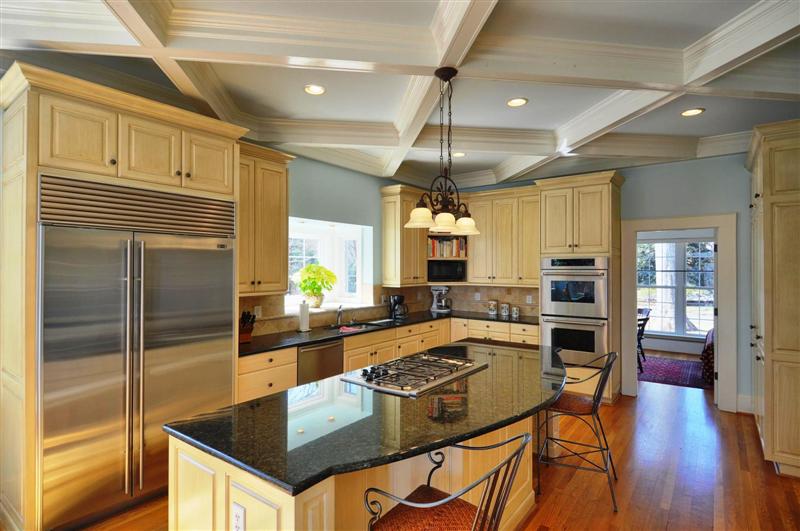 Gourmet kitchen has stainless steel appliances and included Sub-Zero refrigerator