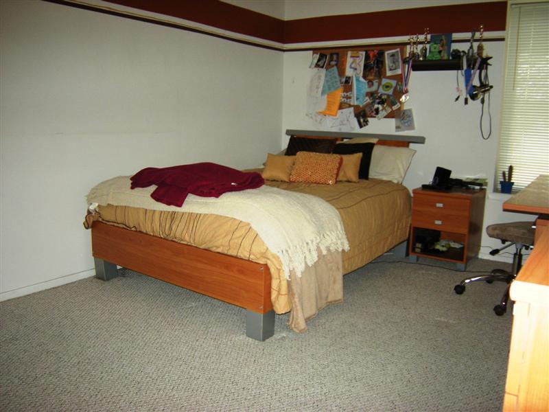 Second bedroom is spacious and has wall-to-wall carpeting