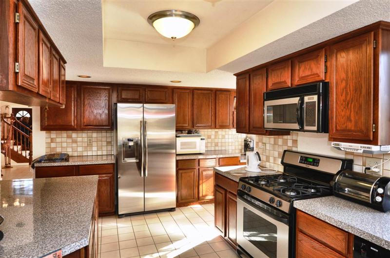 Beautiful cabinetry adorns this delightful kitchen