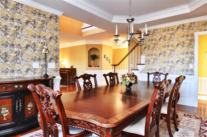 Formal dining room has extensive millwork