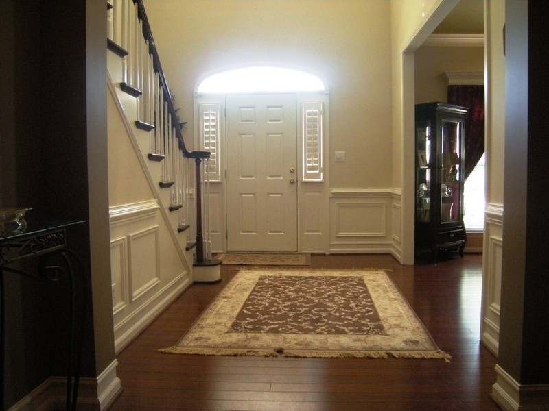 Dramatic two-story foyer upon entry