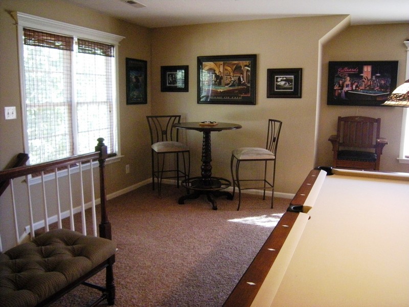 Huge recreation room has additional stairway to main level
