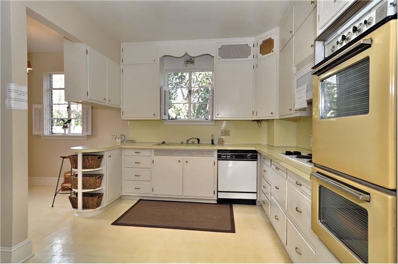 Counter & cabinet space abound in this kitchen
