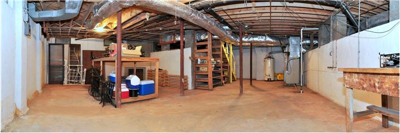 Unfinished basement could easily be made into a media or game room