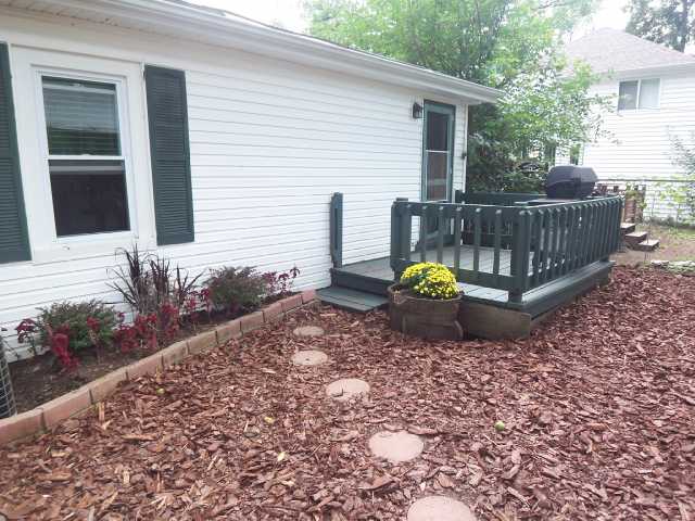 Yard/Garden:   Path along fence leads to shaded,private dog run and gate