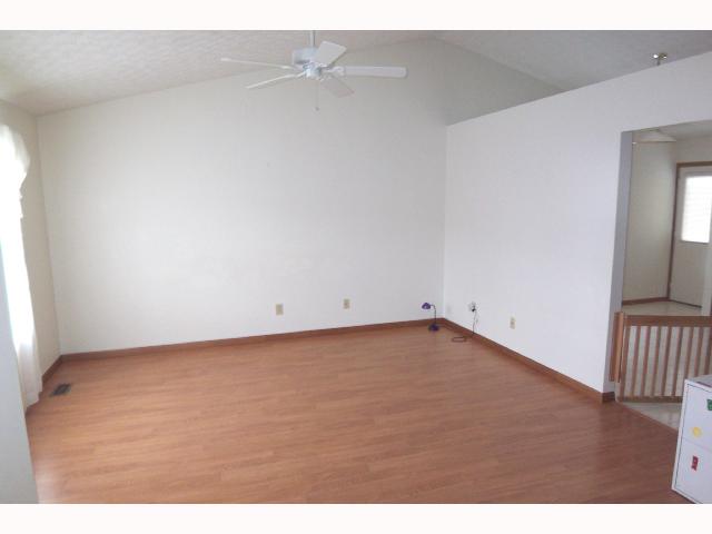 Den/Family/Great Room:   Soaring ceilings, pergo look floors!