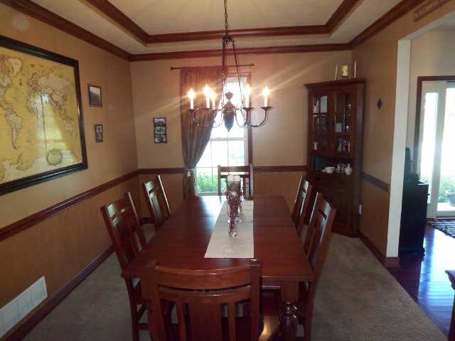 Dining Room:   Holiday size dining room w/ tray ceiling