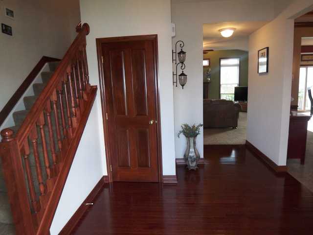 Gleaming hardwood floors welcome you
