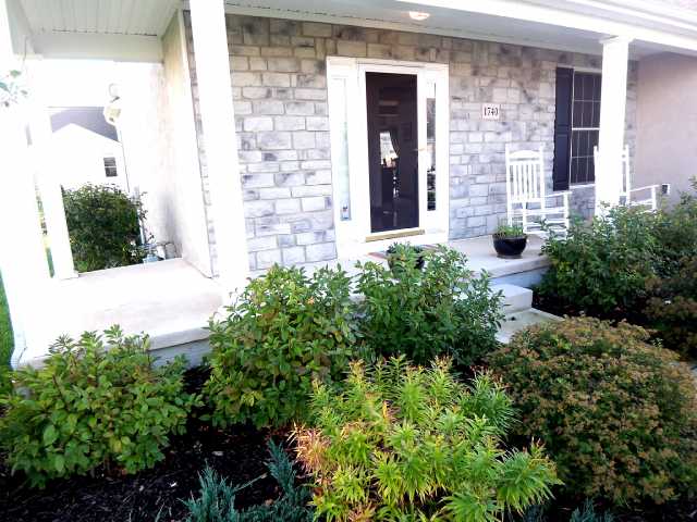 Relax on your wrap around porch overlooking over 1/3 acre yard- perfect for play and entertaining!