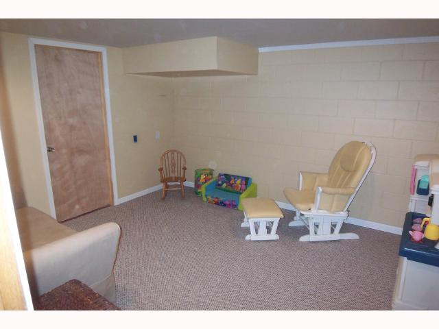 Den/Family/Great Room:   Finished lower level w/can lighting and half bath.