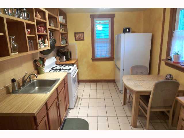 Kitchen:  REMODELED KITCHEN W/ABUNDANCE OF CABINETS-APPLIANCES REMAIN INC WASHER/DRYER