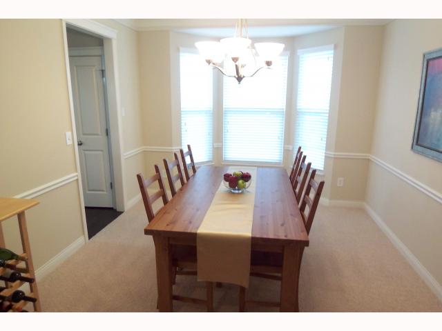 Dining Room:  Holiday size dining room with bay window