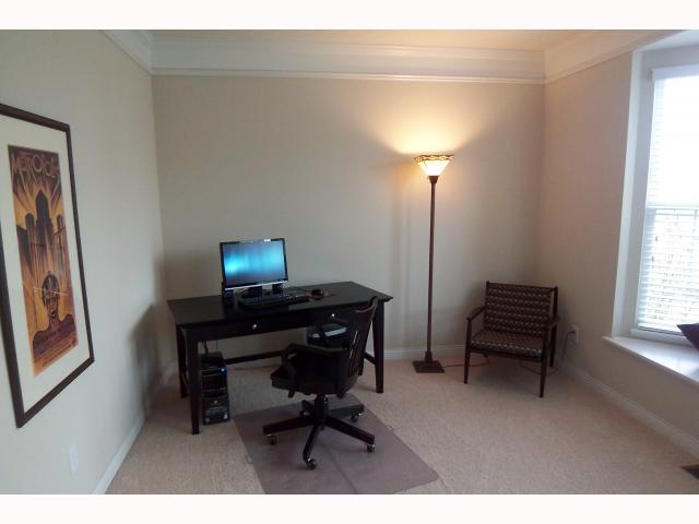 Executive Office/Suite:  First floor office/den with bay window, beautiful crown molding, high ceilings 