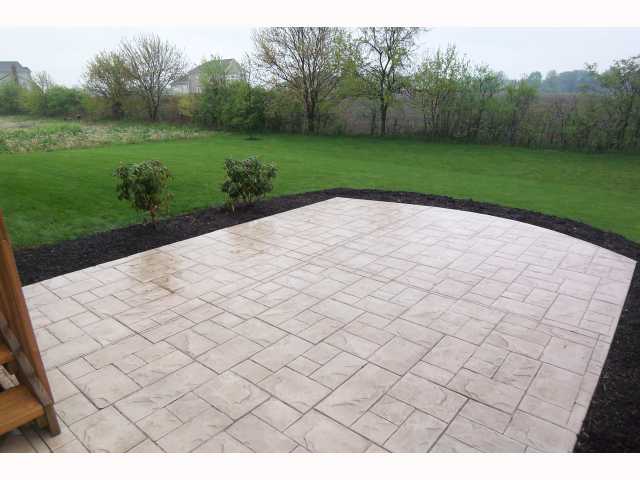Patio/Deck:  Relax on your stamped concrete patio 