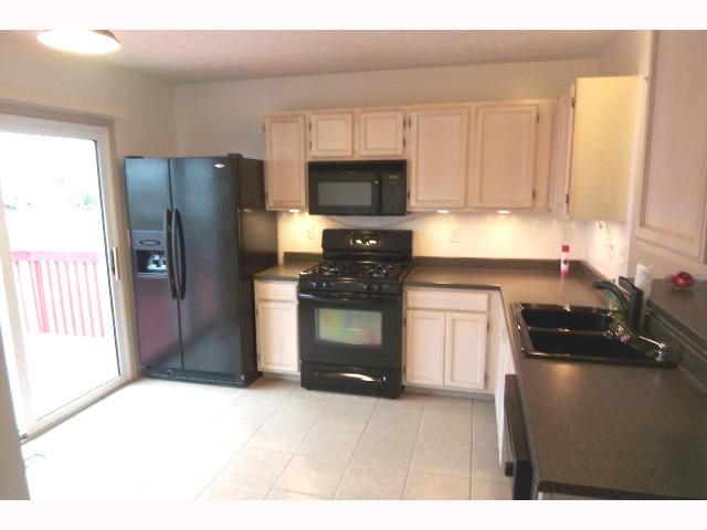 Kitchen:  New ceramic tile flr and countertops, Brand new appliances remain