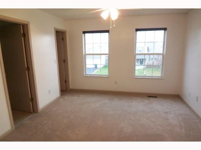 Owner Bedroom:  Sun-filled master bedroom w/walk in closet