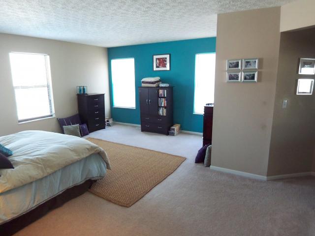 Owner Bedroom:  Regal size master suite w/ walk in closet and private bath w/ ceramic tile surround shower