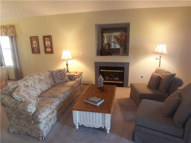 Den/Family/Great Room:  Sun-filled and Spacious great room w/ gas log fireplace w/ marble surround