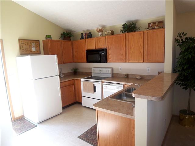Kitchen:  Abundance of cabinets, upgraded ceramic top stove, upgraded counter tops