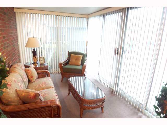 Den/Family/Great Room:  Relax in your Sun-filled Florida room
