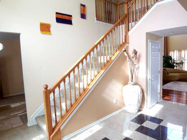 Granite floor soaring 2 story foyer