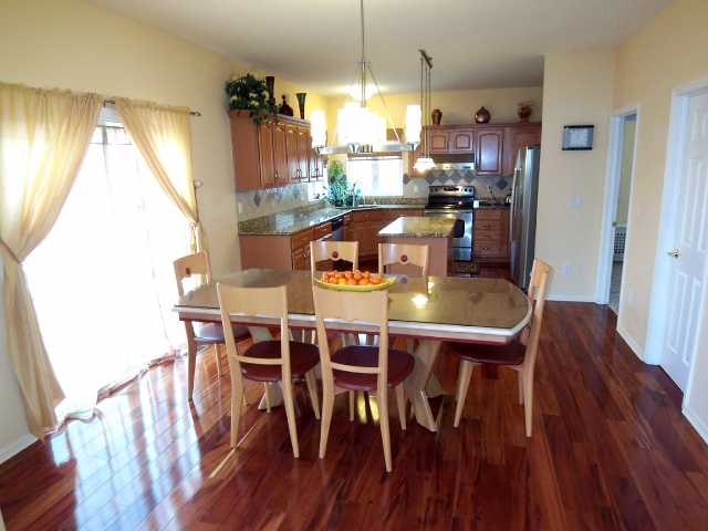 Kitchen:  Gleaming exotic Brazilian Koa wood floors.