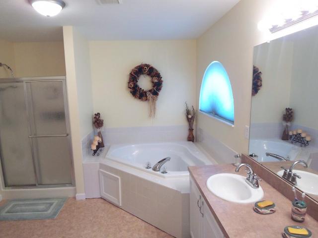 Owner Bath/Spa:  Luxury master bath with jetted tub, double vanity sink