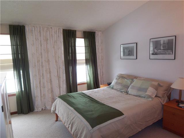 Owner Bedroom:  Vaulted ceiling master suite complete with walk in closet and private bath