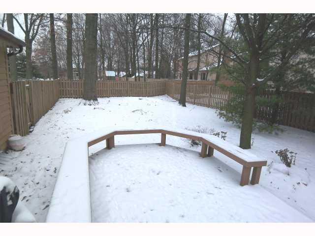 Yard/Garden:  Lots of mature trees, entertainment size deck, privacy fenced yard