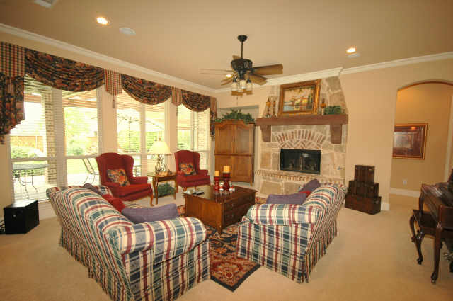 Family room has a view of the beautiful, oversized backyard.