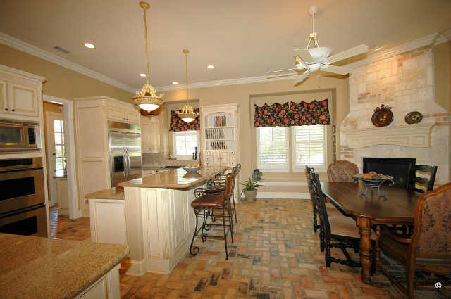 Wide view of kitchen area